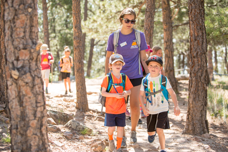 kids hiking learning about the environment