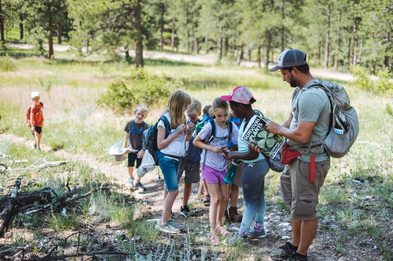 summer camp counselor teaching survival skills