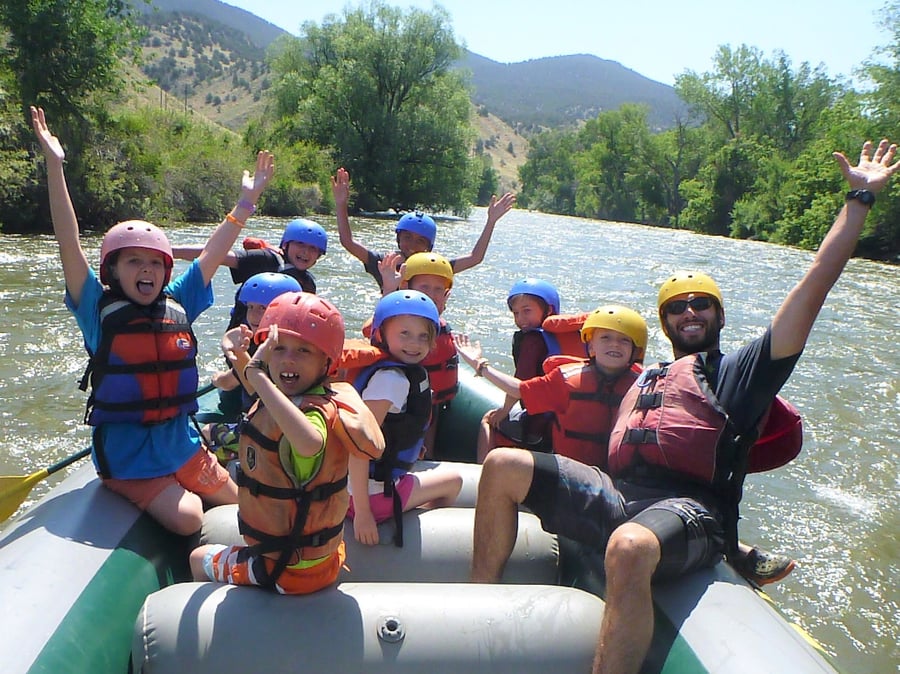 Kids having a blast whitewater rafting